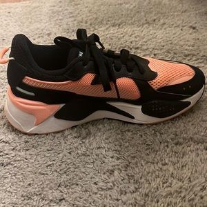Puma rsx shoes, pink and black, have been used but are still in good condition